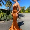 backless, low v neck, mermaid type, sexy, rust, formal gown