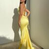 low v neck, lace up back, low back, mermaid type, yellow, formal gown