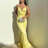 low v neck, lace up back, low back, mermaid type, yellow, formal gown