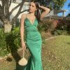 emerald formal gown with lace up back, V neckline, and classic mermaid shape with a slight train