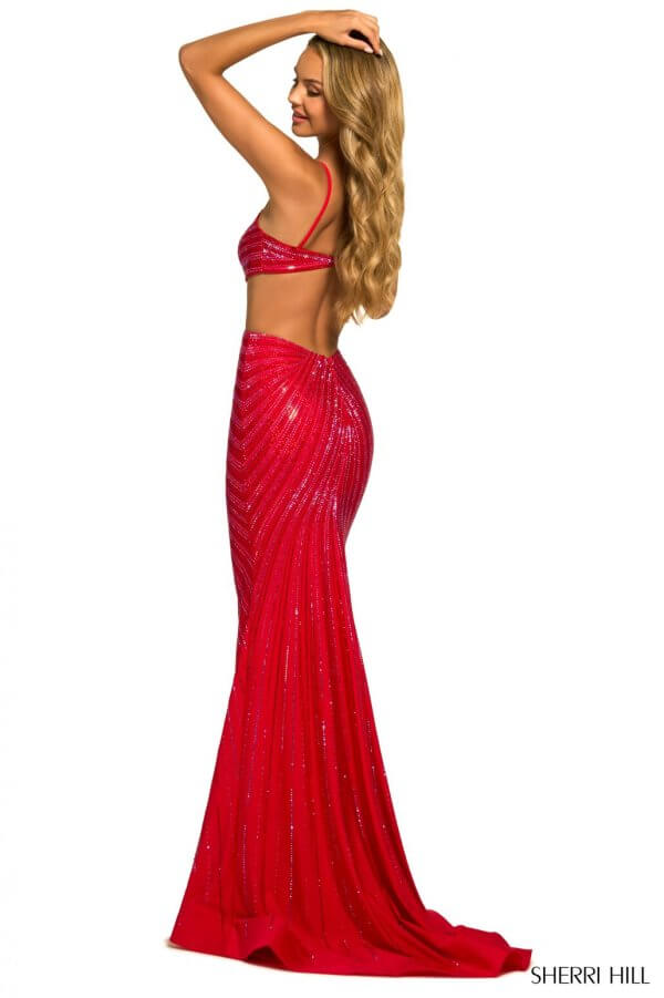 Hot fix fitted gown with plunging deep V neckline, side cuts, and open back