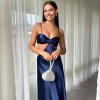 navy formal gown in bias cut silhouette with no zippers and pull on style