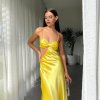 yellow formal gown in bias cut silhouette with no zippers and pull on style