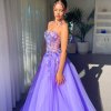 lilac formal gown with spaghetti straps and sweetheart neckline
