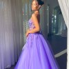 side view of lilac formal gown with spaghetti straps and sweetheart neckline