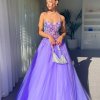 lilac formal gown with spaghetti straps and sweetheart neckline