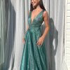 sage glitter gown with plunge neckline, open back and full luxe skirt with pockets