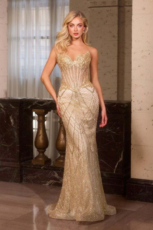 Taylor Gown in Gold featuring a sweetheart corset bodice, intricate beaded embellishments, fitted mermaid silhouette and dramatic train.