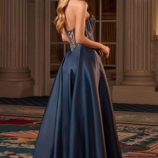 Back view of the Mary Gown in Navy satin featuring a crystal embellished corset bodice, lace-up back and full A-line skirt.