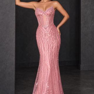 Coco Gown in rose pink, featuring a strapless corset bodice, lace-up back, intricate beading and a fitted skirt with a sweeping train, shown from the back.