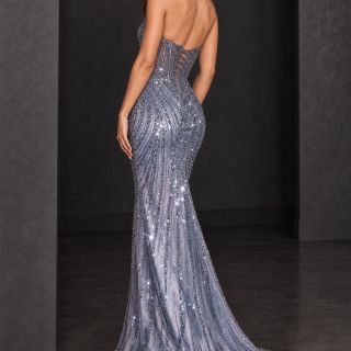 Coco Gown in Silver Blue, featuring a strapless corset bodice, lace-up back, intricate beading and a fitted skirt with a sweeping train, shown from the back.